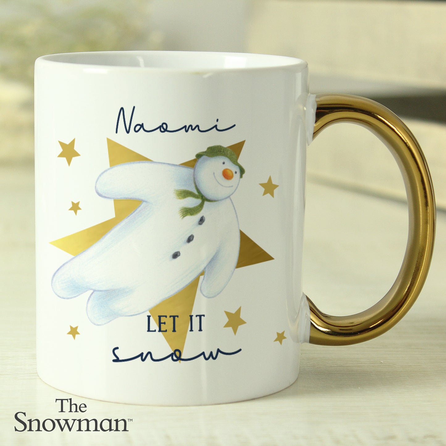 The Snowman Let it Snow Gold Handed Mug